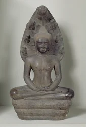 Buddha sitter i meditation på Naga, Angkor (brons)